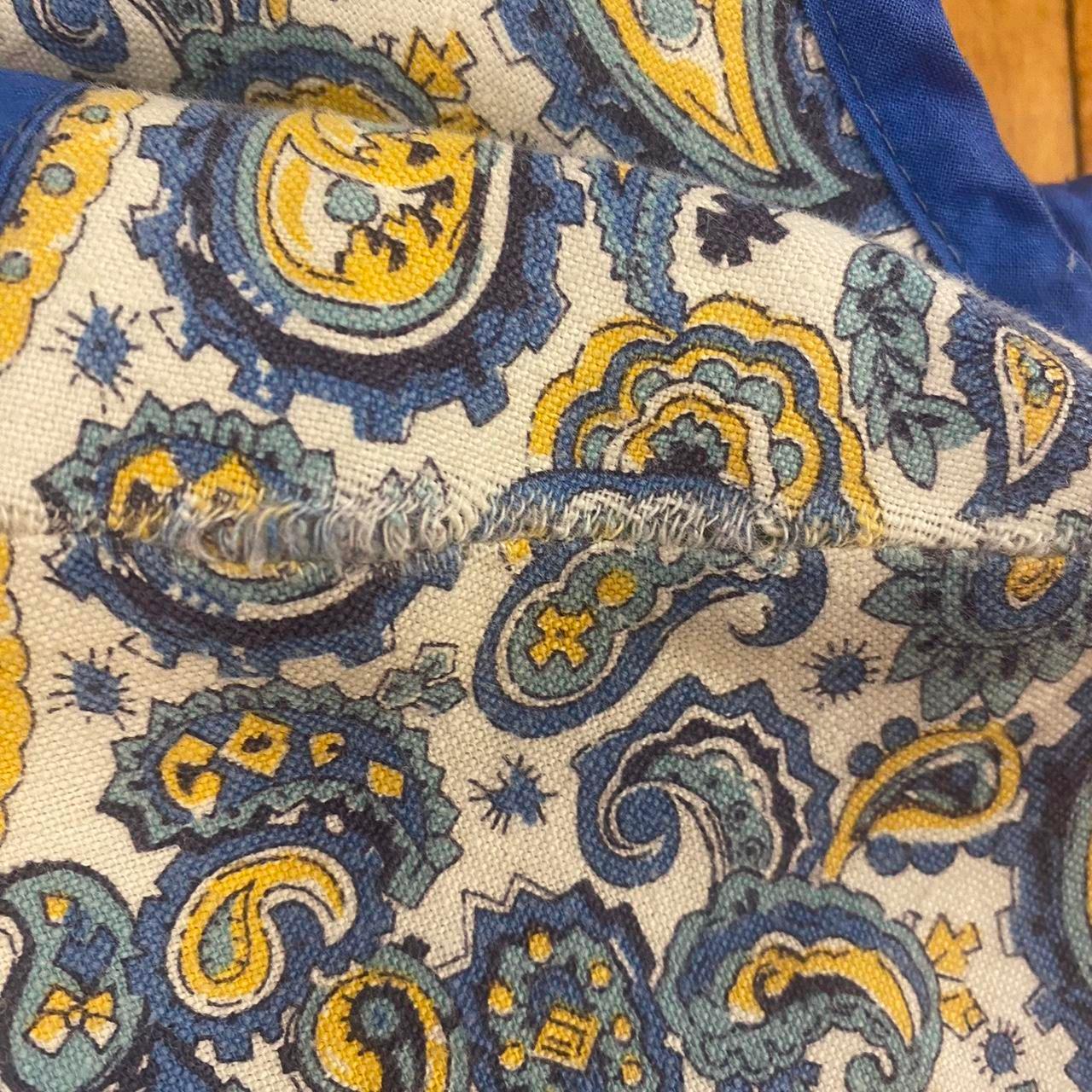 1950s blue and yellow cotton paisley apron top with tie and pockets