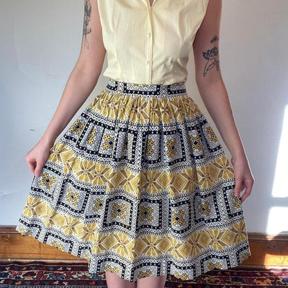 1950s cotton yellow and black folk art printed circle skirt