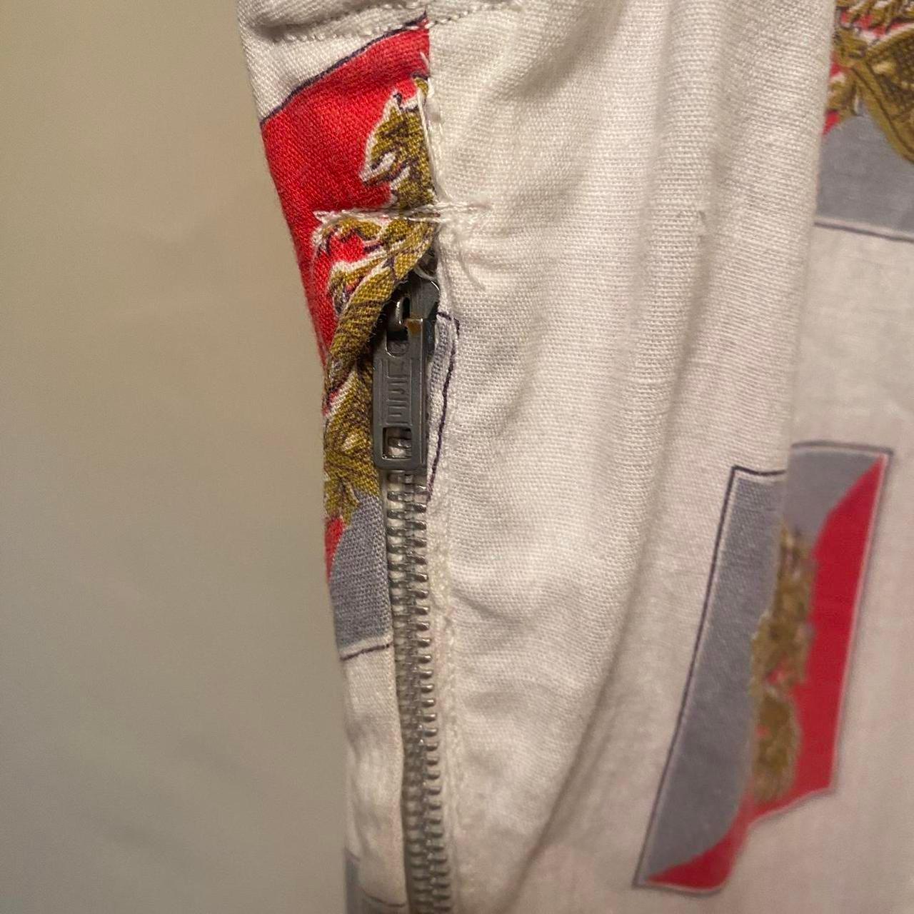 1950s cotton ornate crest novelty print fit and flare sleeveless dress