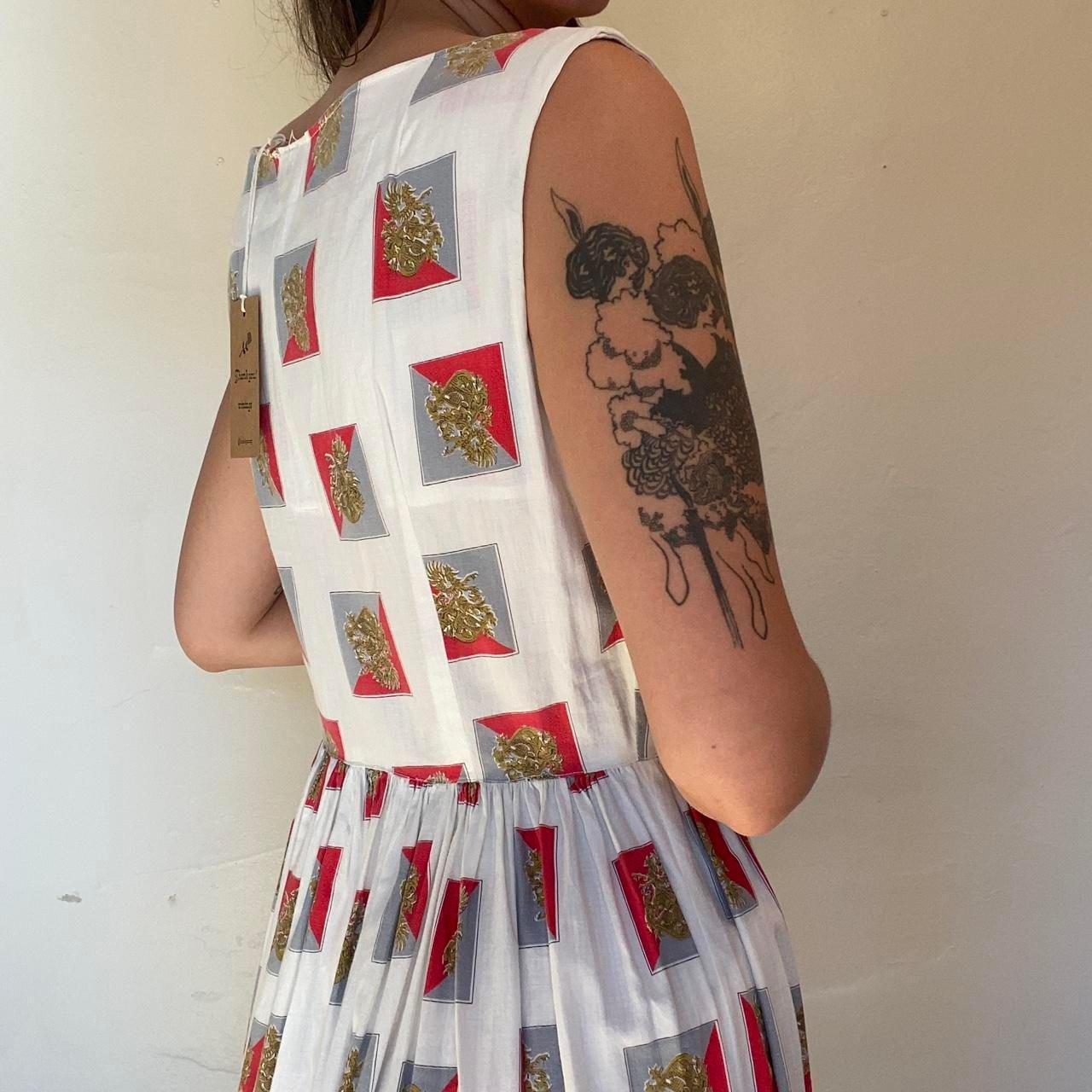 1950s cotton ornate crest novelty print fit and flare sleeveless dress