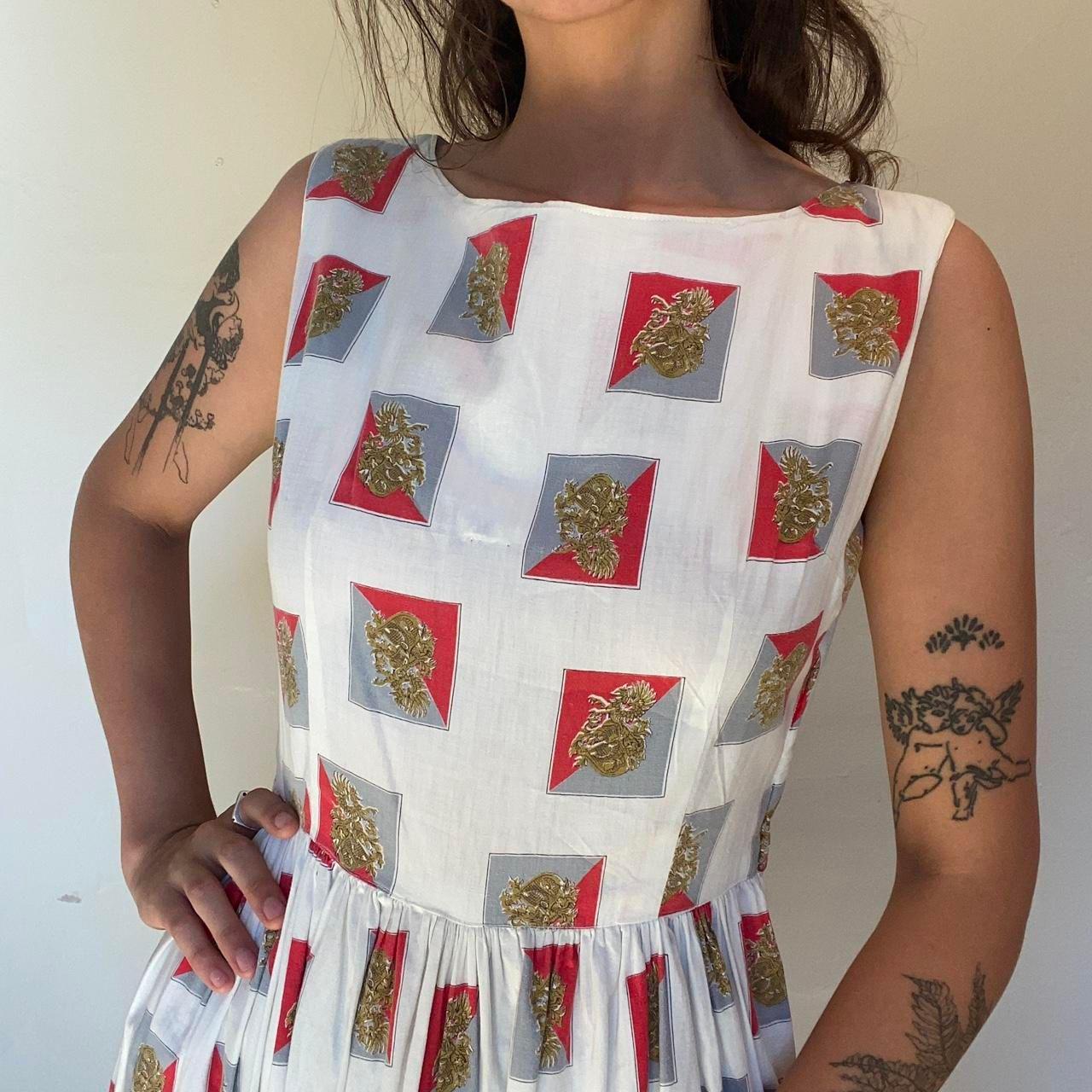 1950s cotton ornate crest novelty print fit and flare sleeveless dress
