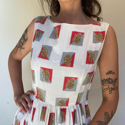 1950s cotton ornate crest novelty print fit and flare sleeveless dress