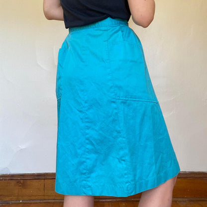 1950s cotton turquoise circle skirt with pleating and side pockets