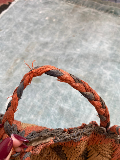1940s raffia woven circle purse