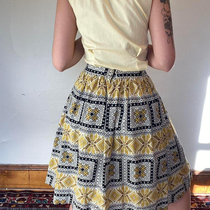 1950s cotton yellow and black folk art printed circle skirt