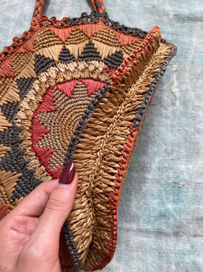 1940s raffia woven circle purse
