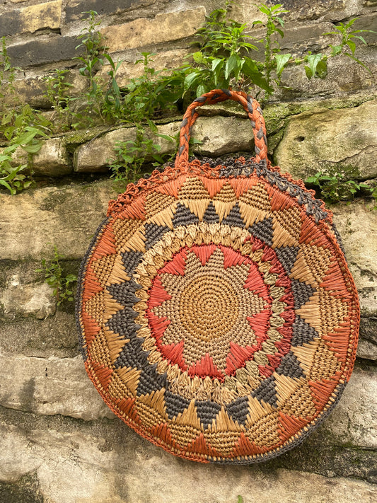 1940s raffia woven circle purse