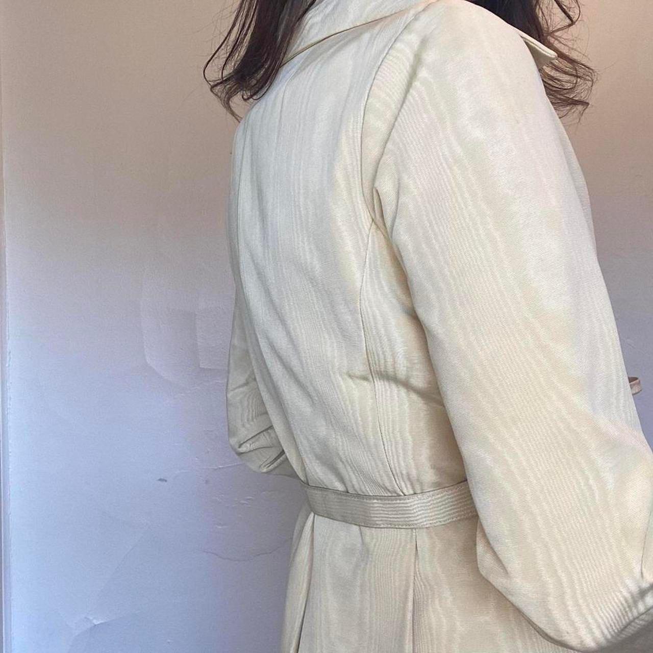 1960s union made butter yellow moire rayon trench coat and pleats on the back