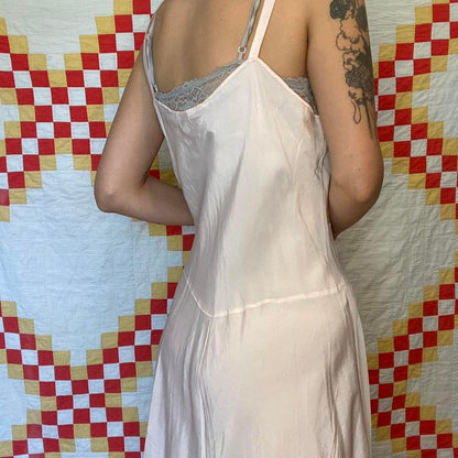 1940s light pink rayon dress with ruffled hem