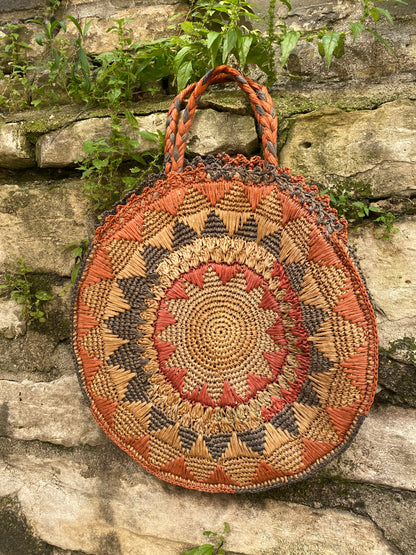 1940s raffia woven circle purse