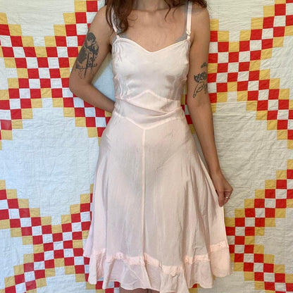 1940s light pink rayon dress with ruffled hem