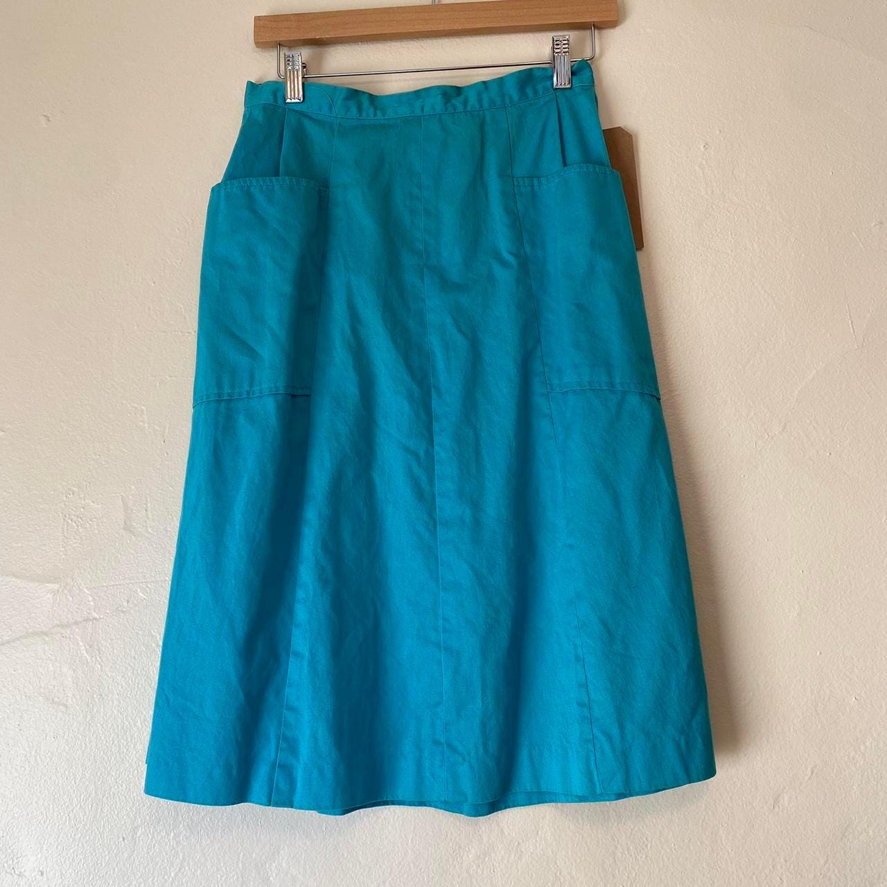 1950s cotton turquoise circle skirt with pleating and side pockets