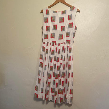 1950s cotton ornate crest novelty print fit and flare sleeveless dress