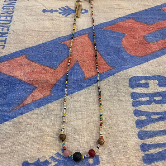 vintage handmade kitschy beaded folk necklace with safety pin closure